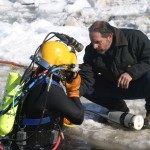 preparing diver to locate underwater UXO