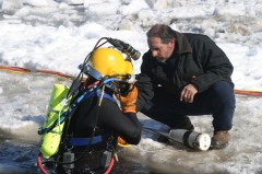 preparing diver to locate underwater UXO