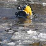 diver with cameras attached to helmet