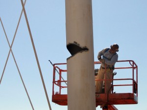 cutting water tower legs to control direction of collapse