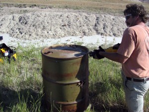 opening barrel to test for hazardous waste