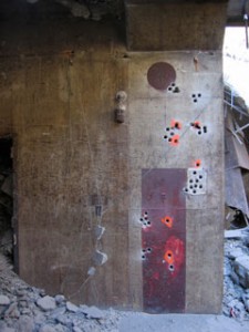 blasting holes for explosive demolition of Nike missile magazine