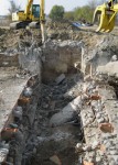 bulldozing rubble after explosive demolition