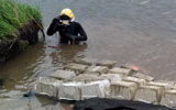 diver assist in bank reconstruction