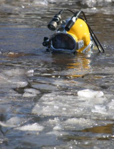 diver with helmet-mounted camera in icy Alderwood Lake