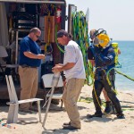 VRHabilis divers and crew preparing for a UXO dive