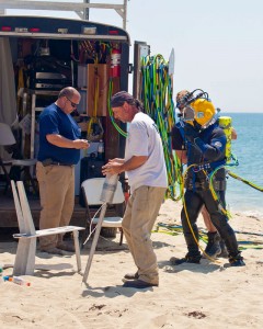 VRHabilis divers and crew preparing for a UXO dive