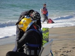 preparing to dive from the beach