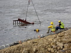 dive team assists with underwater placement