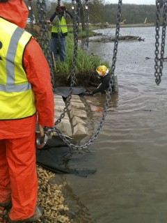 diver assists with bank reinforcement